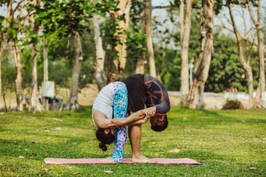 Partner yoga pose - Standing Forward Fold Pose