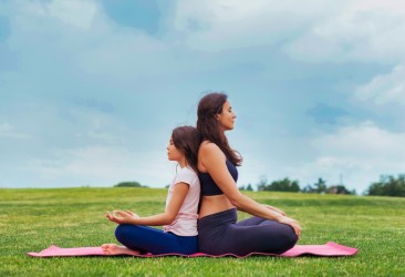 Partner yoga pose - seated meditation