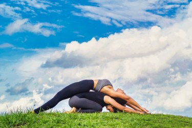Partner yoga pose - Childs Pose and Backbend