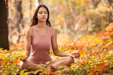 Yoga student Autumn meditation