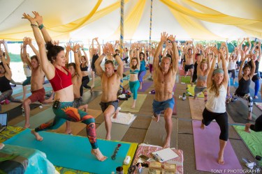 teaching yoga at festival